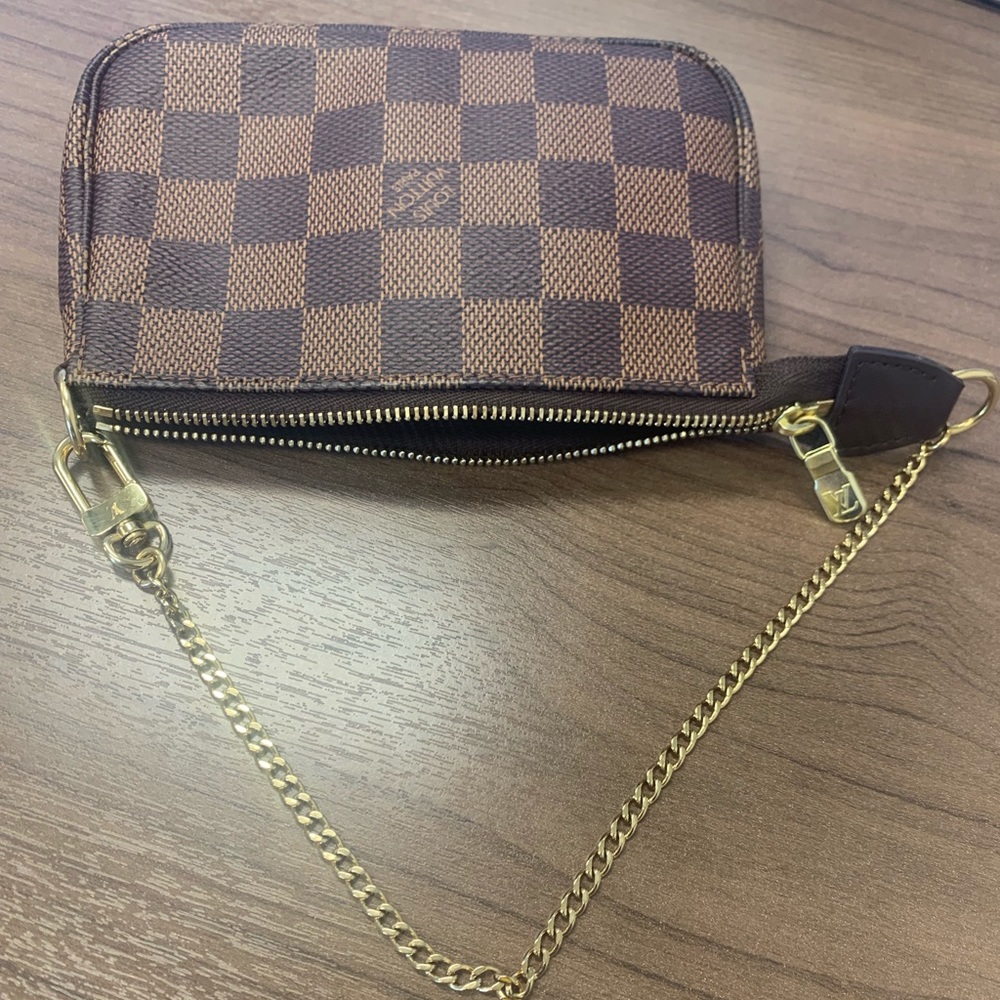 Louis Vuitton Mini pouchette in damier ebene